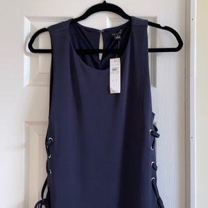 Ann Taylor navy dress with lace up sides.